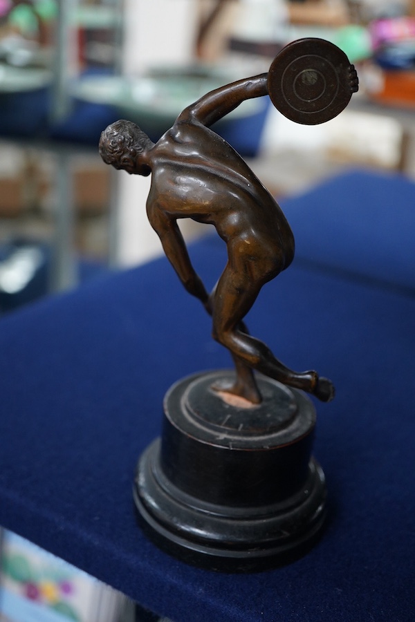 A bronze study of a classical discus thrower with silver mounted plaque to the base, 17cm high
